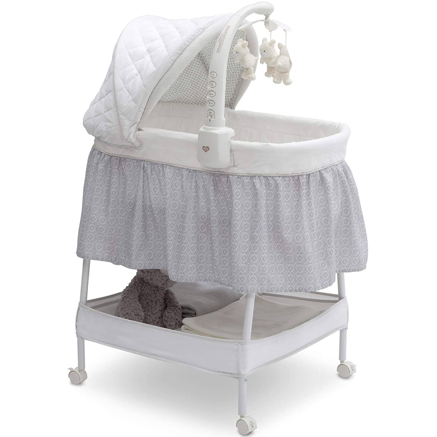 Smooth Glide Bedside Bassinet   Portable Crib with Activity Mobile Arm Featuring Spinning Toys, Nightlight and Music, Silver Linings